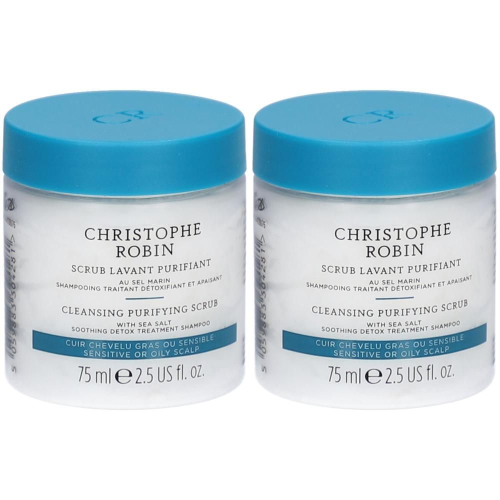 Deux pots blancs avec couvercles bleus. Inscription: CHRISTOPHE ROBIN, SCRUB LAVANT PURIFIANT, CLEANSING PURIFYING SCRUB.