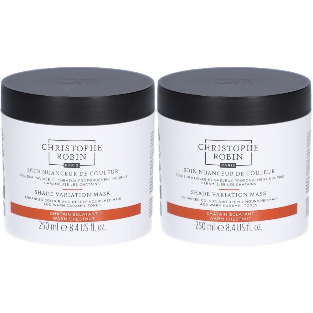 Deux pots ronds avec couvercles noirs. Inscription: CHRISTOPHE ROBIN PARIS, SOIN NUANCEUR DE COULEUR, SHADE VARIATION MASK, CHATAIN ECLATANT, WARM CHESTNUT.