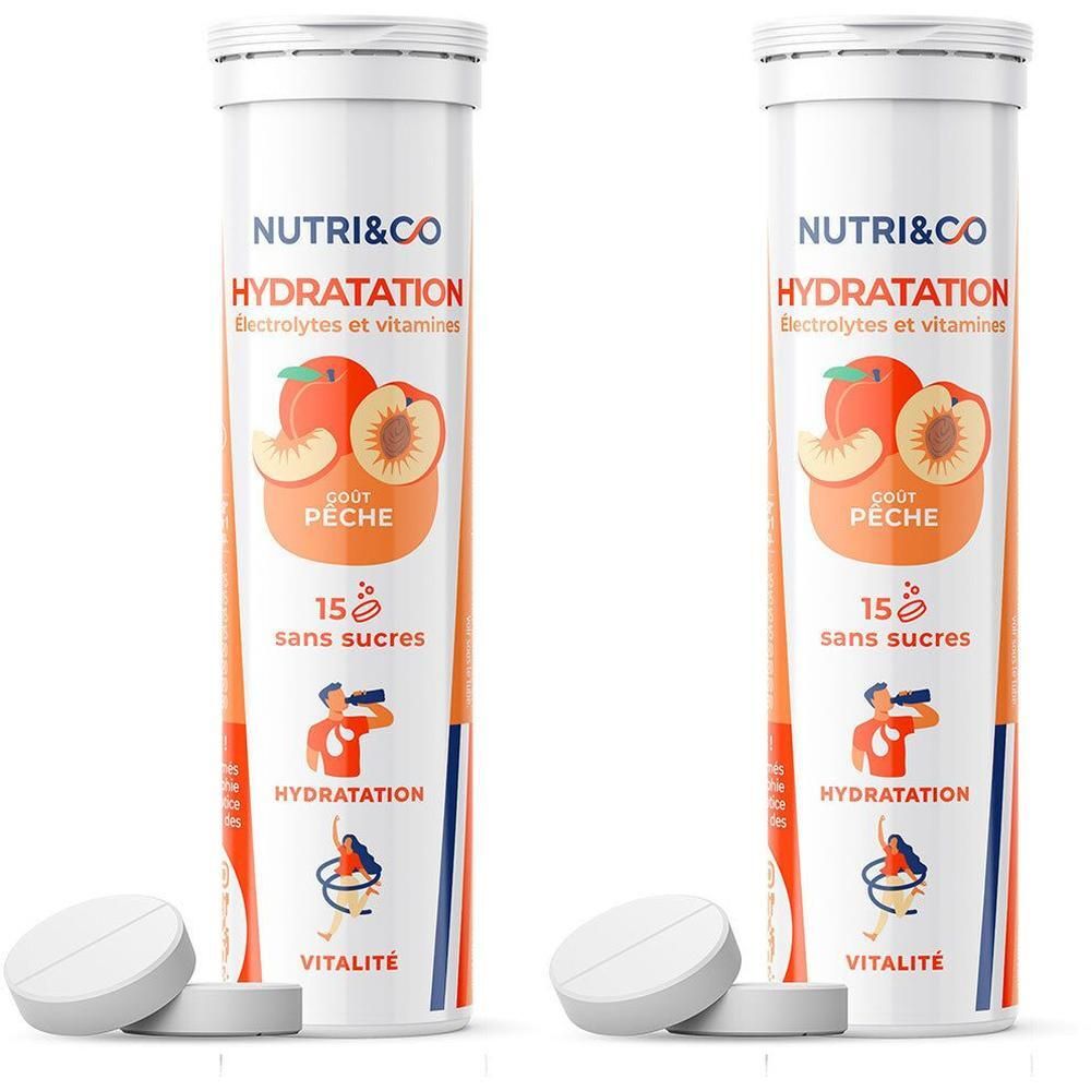 Deux tubes NUTRI&CO Électrolytes. Inscription: Hydratation, goût pêche, 15 sans sucres. Deux comprimés blancs devant.