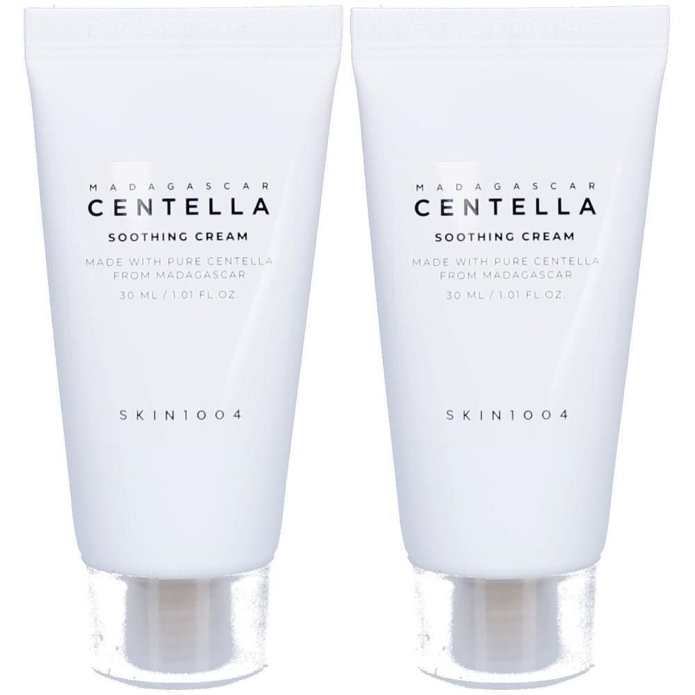 Deux tubes de crème blancs. Inscription: MADAGASCAR CENTELLA SOOTHING CREAM. Marque: SKIN1004. Bouchon transparent.