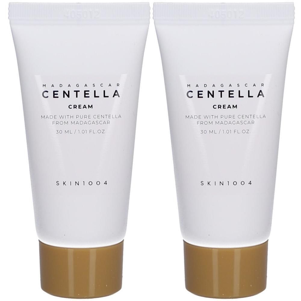 Deux tubes de crème blancs avec bouchons bruns. Inscription: Madagascar Centella Cream, 30 ml. Marque: Skin1004.