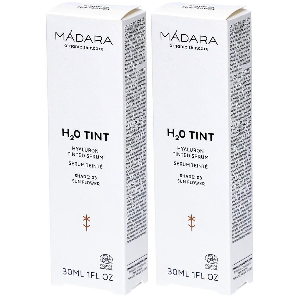 Deux boîtes blanches. Texte imprimé: MÁDARA, H2O TINT, Sérum Teinté Hyaluron, Shade: 03 Sun Flower, 30ML 1FL OZ. Certificat COSMOS NATURAL.