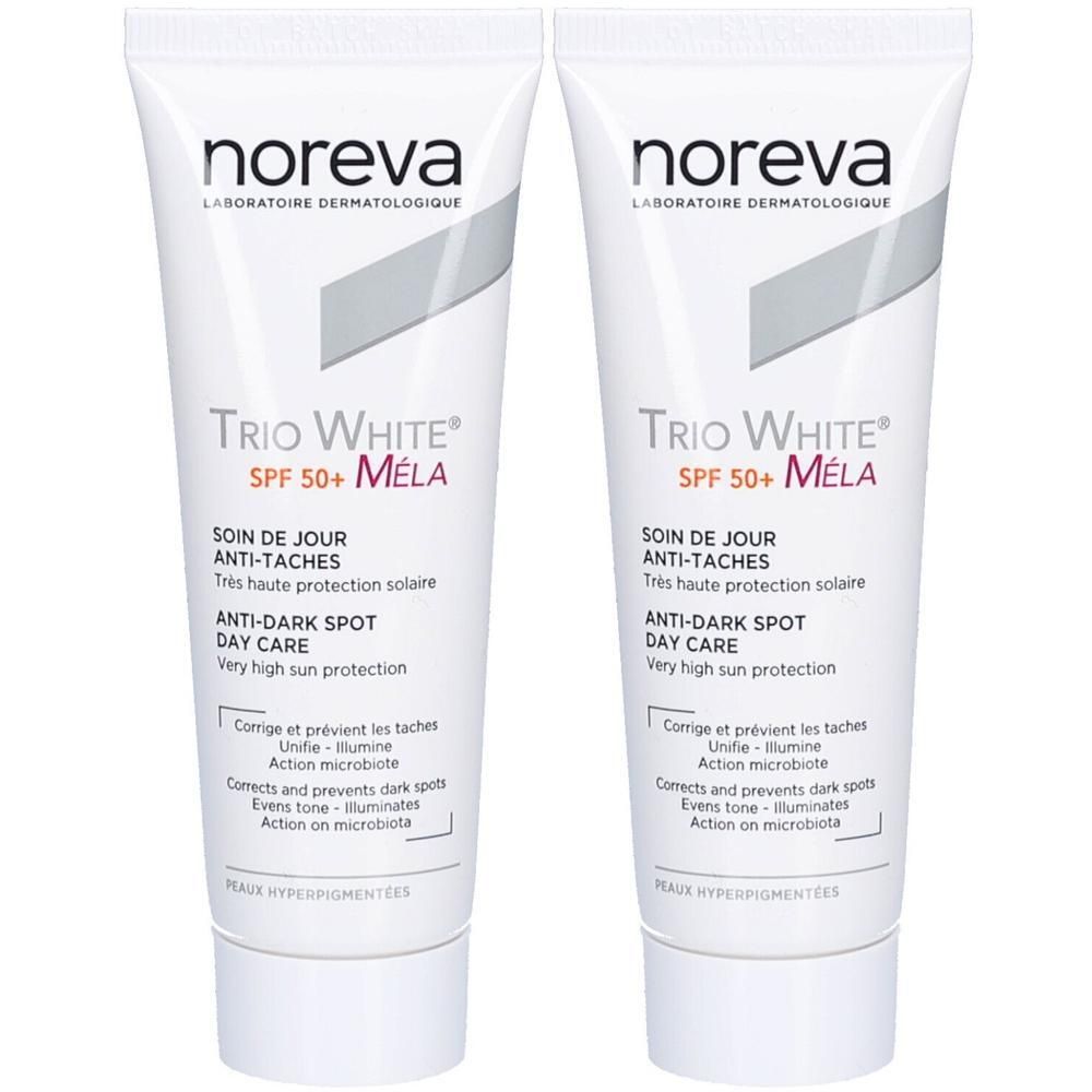 Deux tubes de crème Trio White Mela SPF50+. Tubes blancs avec texte rouge et noir. Marque Noreva. Texte: Anti-taches, soin de jour, haute protection solaire.