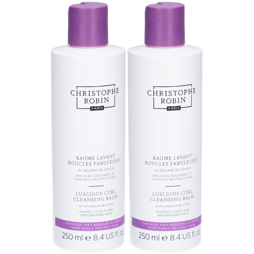 Deux flacons blancs avec bouchons violets. Inscription: Christophe Robin, Baume Lavant Boucles Fabuleuses, Luscious Curl Cleansing Balm. 250 ml.