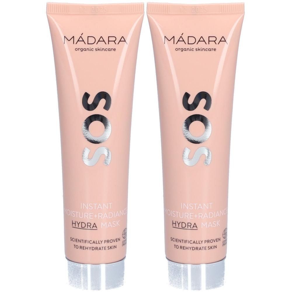 Deux tubes de MÃ¡dara Hydra Mask. Tubes roses avec texte argentÃ©. Inscription: SOS, Instant Moisture + Radiance, Hydra Mask.