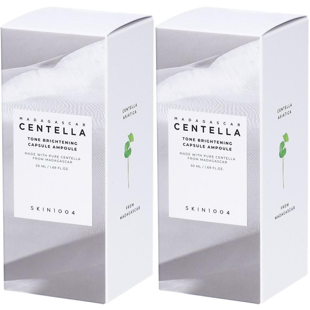 Deux boîtes blanches. Texte: MADAGASCAR CENTELLA Tone Brightening Capsule Ampoule. Marque SKIN1004.