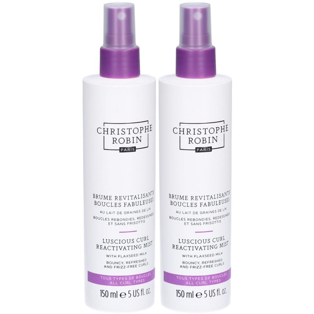 Deux flacons vaporisateurs blancs avec bouchons violets. Inscription: Christophe Robin, Brume Revitalisante, Luscious Curl Reactivating Mist.
