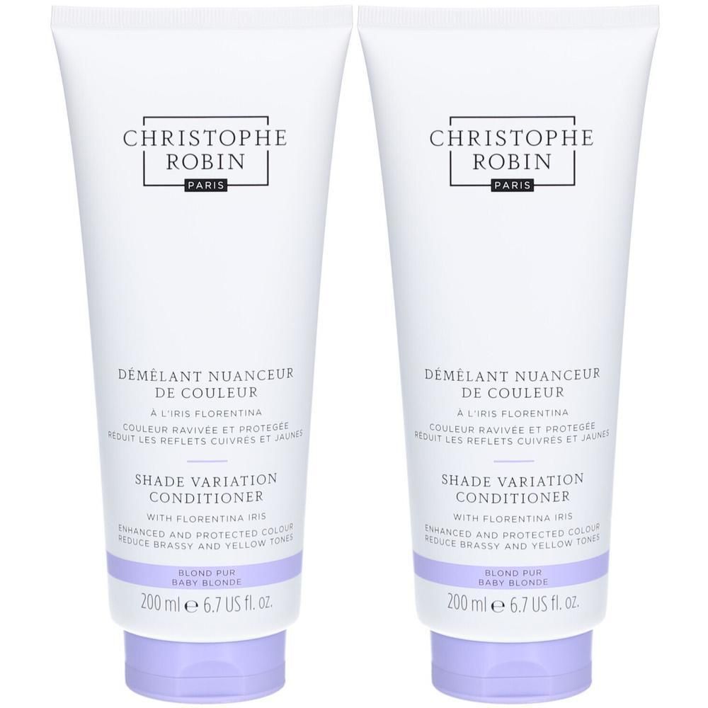 Deux tubes blancs. Inscription: CHRISTOPHE ROBIN PARIS. Nom du produit: DEMELANT NUANCEUR DE COULEUR. Texte: SHADE VARIATION CONDITIONER. Couleur: Baby Blonde.