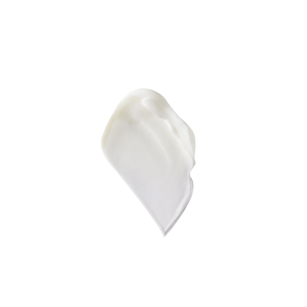 Goutte de crème blanche. Sur fond blanc. Forme de goutte.