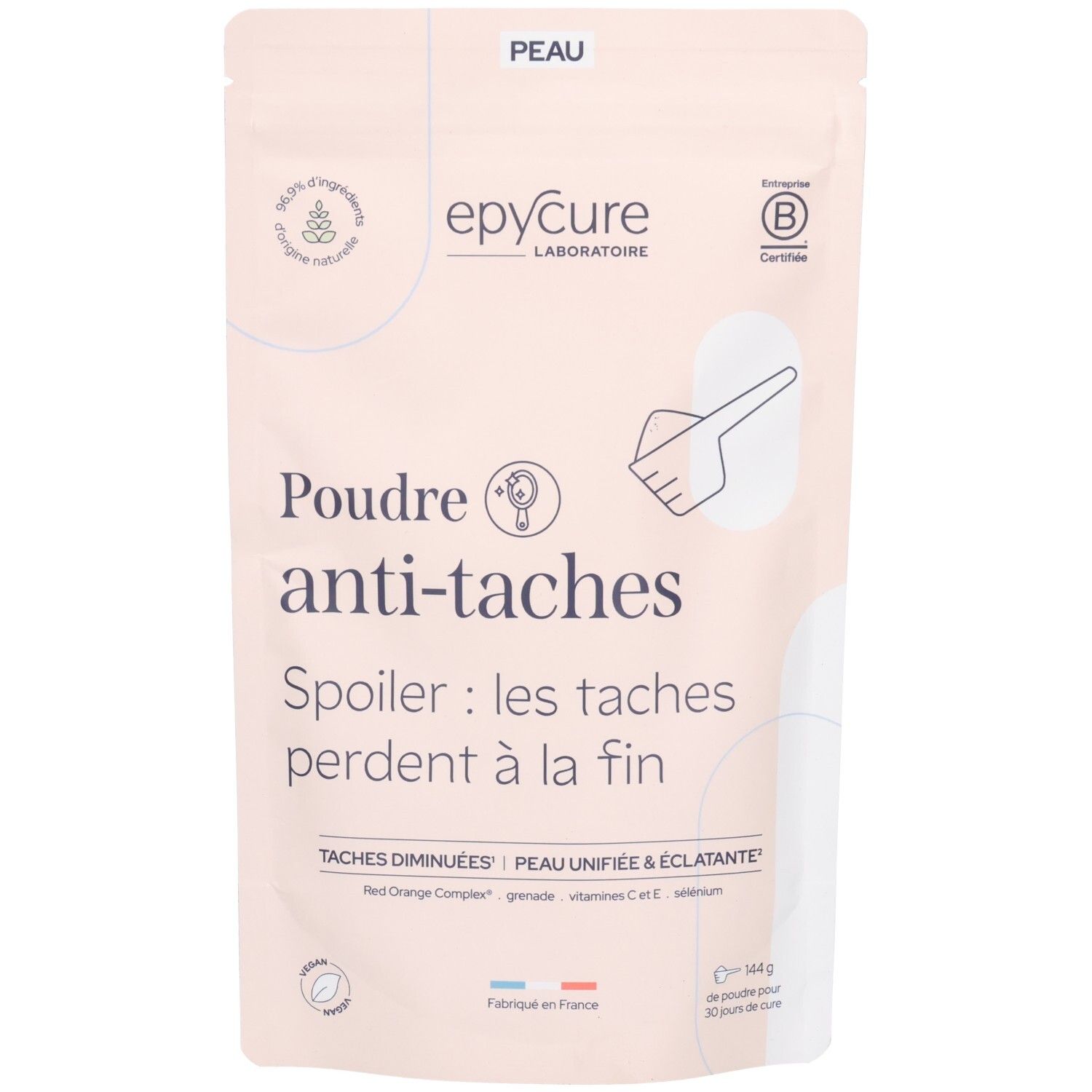 Sachet de Poudre anti-taches. Emballage rose avec logo et texte. Certifications et ingrédients visibles.