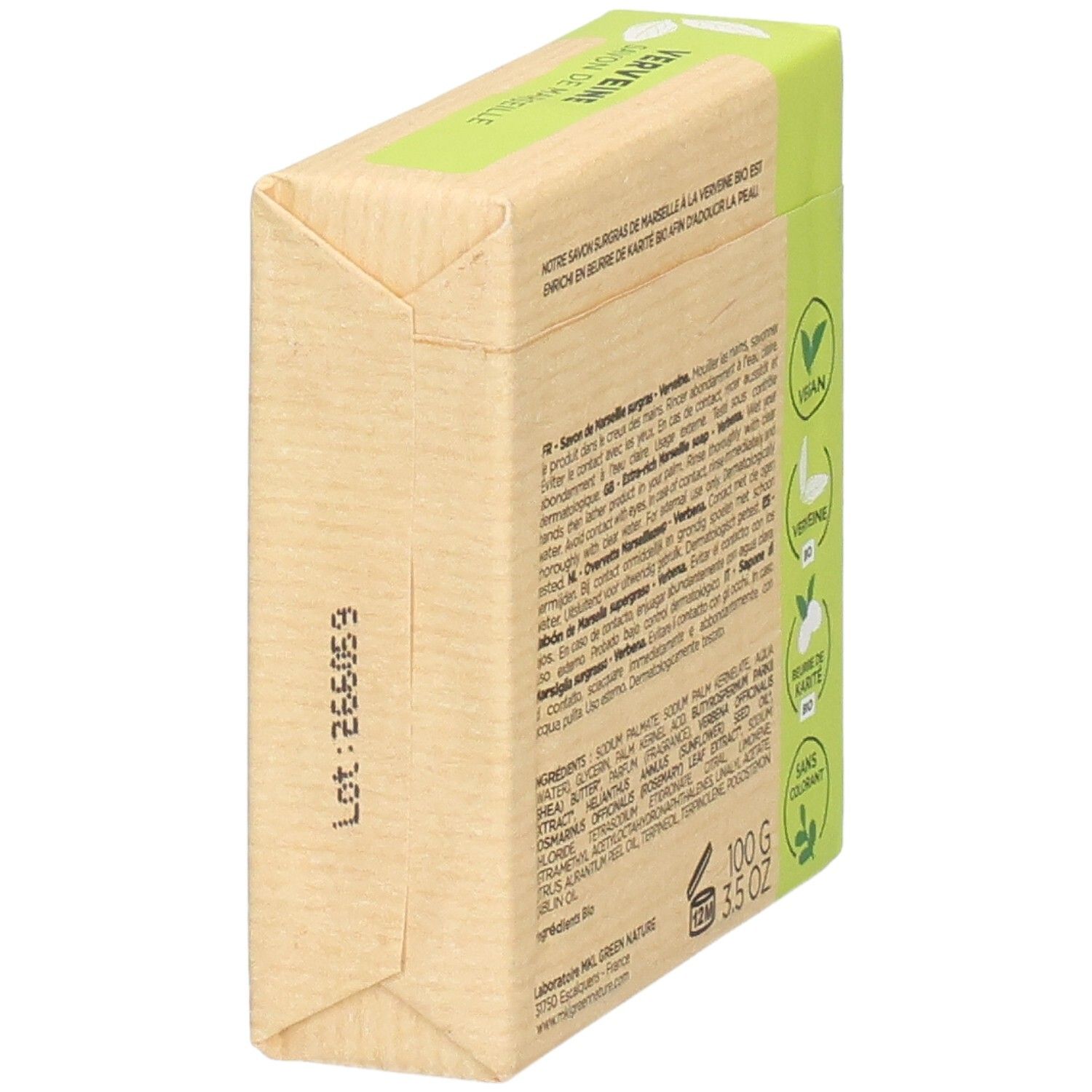 Savon emballé, 100g. Emballage extérieur en papier naturel avec accents verts et informations produit.