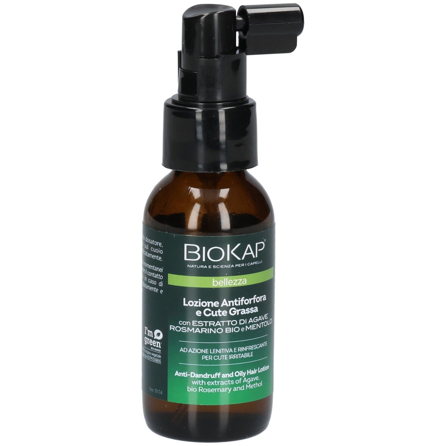 Flacon brun avec vaporisateur noir. Inscriptions: BIOKAP, bellezza, Lotion Antiforfora e Cute Grassa. Étiquettes vertes et blanches.