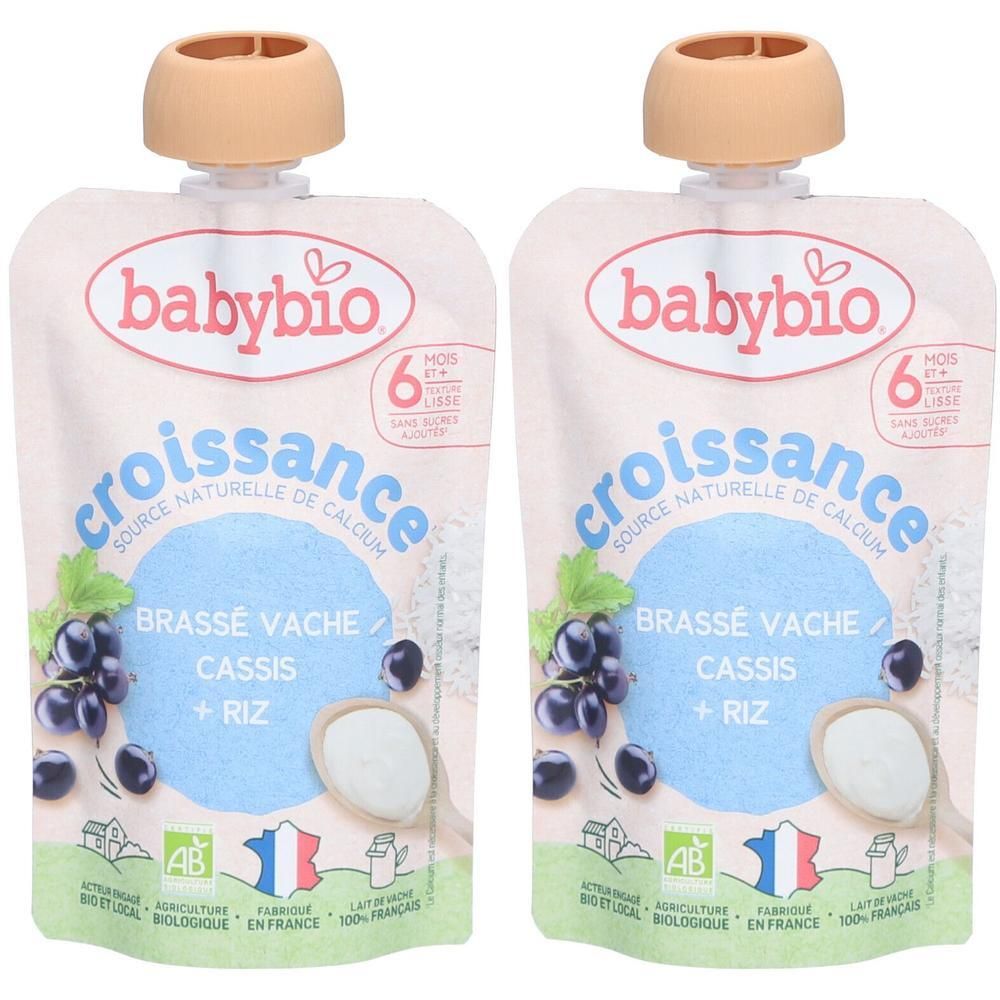 Deux sachets BABYBIO Brassé Croissance. Inscription: Cassis + Riz. Bouchon à vis. Label bio et origine France.