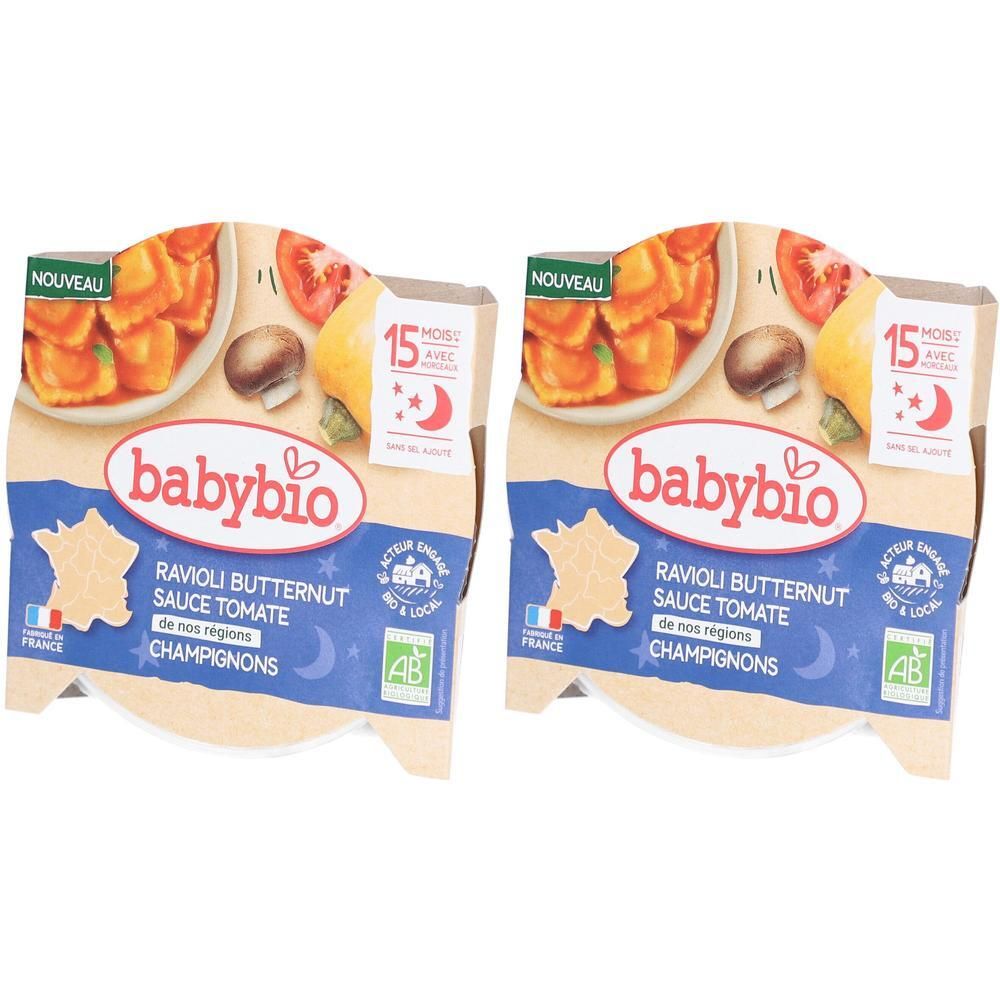 Deux emballages de raviolis Babybio. Inscriptions : Ravioli Butternut Sauce Tomate Champignons, label AB, 15 mois, Nouveau.