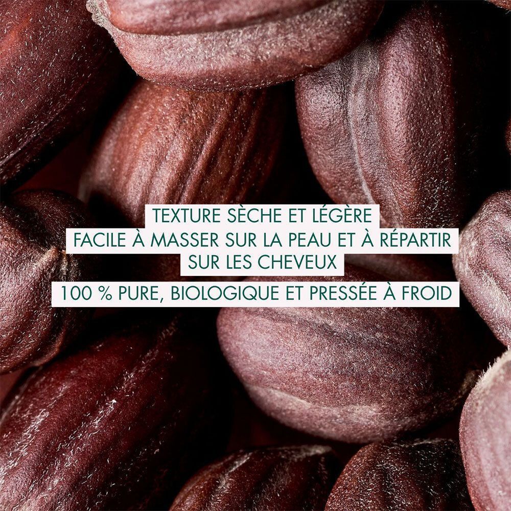 Gros plan de graines. Texte: 100% pur, biologique et pressé à froid. Texture: sèche et légère.