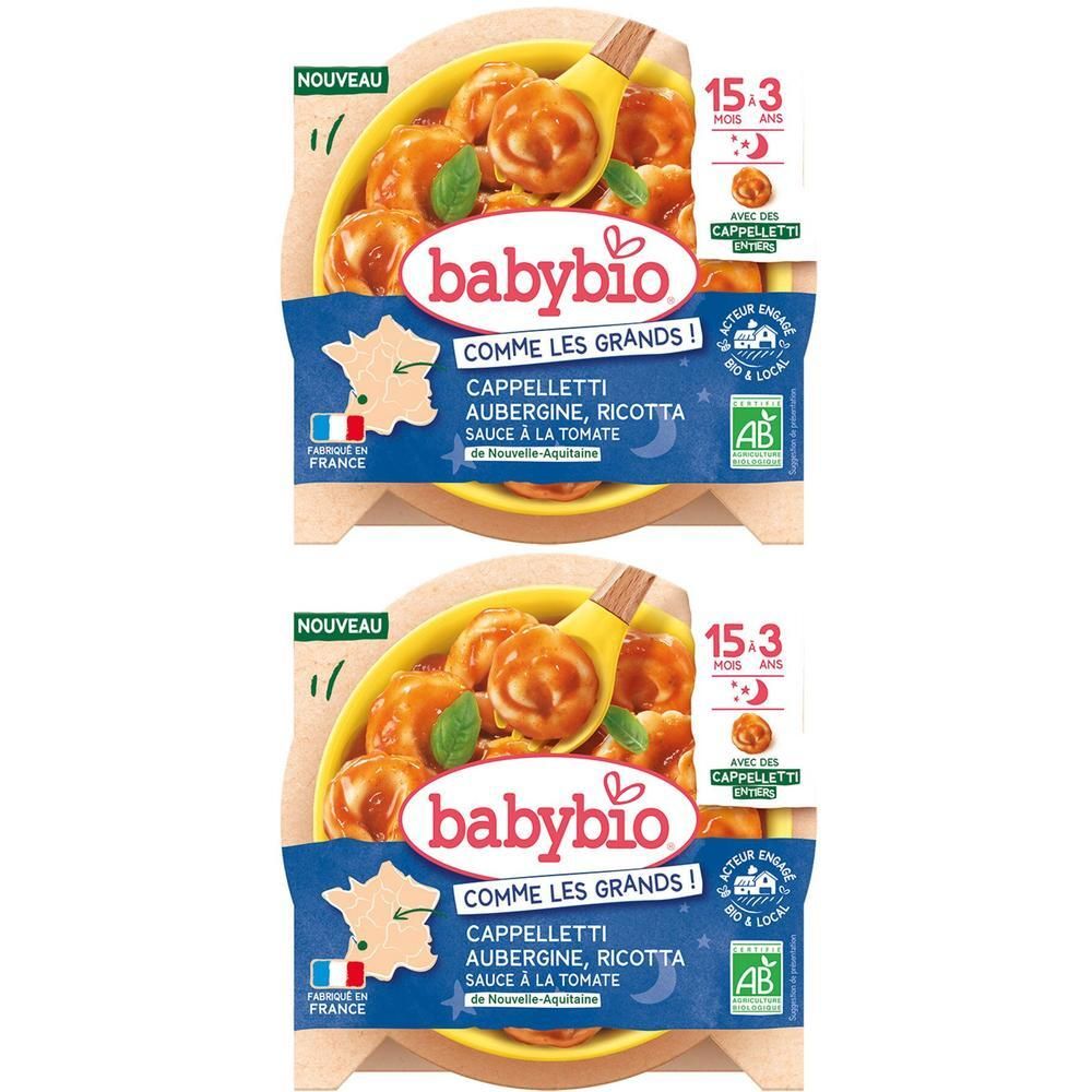 Deux barquettes Babybio Cappelletti. Inscription: Aubergine, Ricotta, Sauce à la Tomate. Logo AB bio. Recommandé pour 15-3 mois.