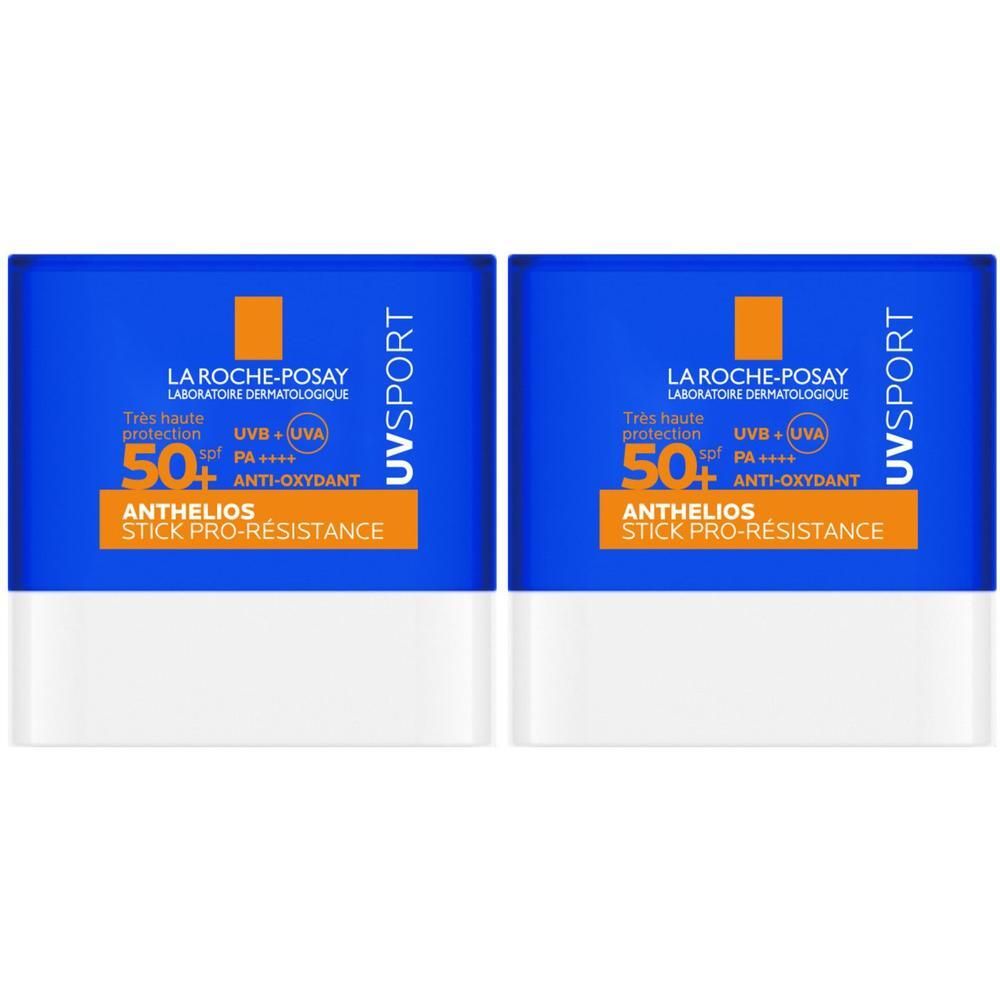 Deux sticks solaires bleus et blancs. Inscription: Anthelios UVSport Stick Pro-Resistance SPF50+. Marque La Roche-Posay.