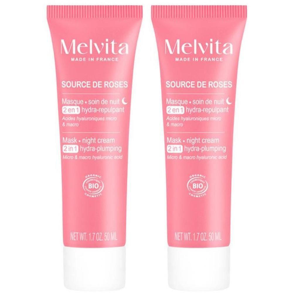 Deux tubes roses de Melvita Source de Roses Crème Nuit Hydra Repulpante. Inscription : Masque + crème de nuit, 2 en 1, hydra-repulpant.