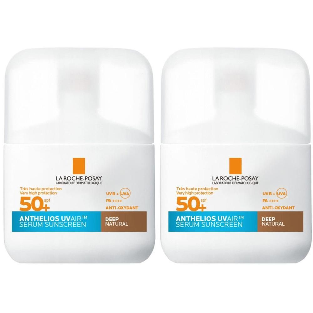 Deux flacons blancs avec bouchon blanc. Inscription: La Roche-Posay, Anthelios UVAir Serum Sunscreen SPF50+, Deep Natural.