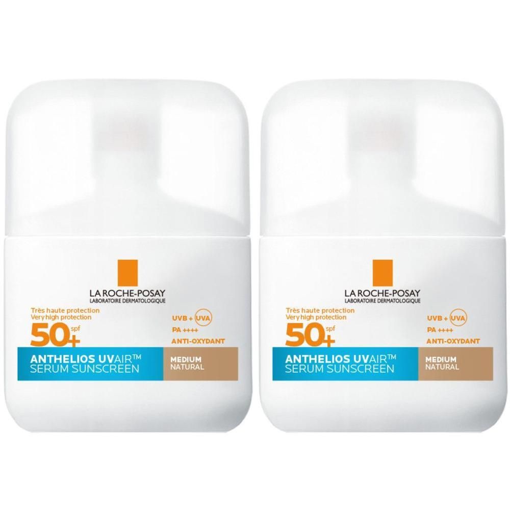 Deux flacons blancs avec logo orange. Inscription: Anthelios Uvair Serum Sunscreen SPF50+.