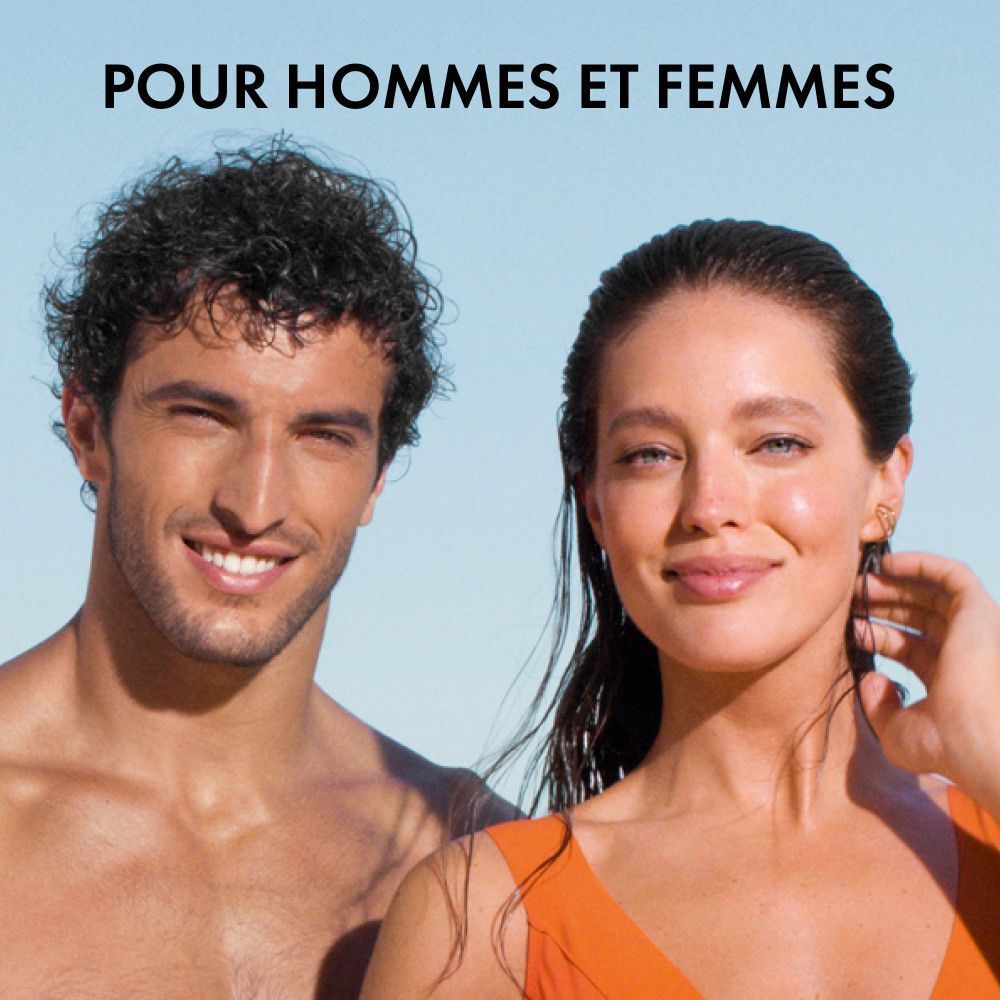 Homme et femme souriants. Texte: POUR HOMMES ET FEMMES.