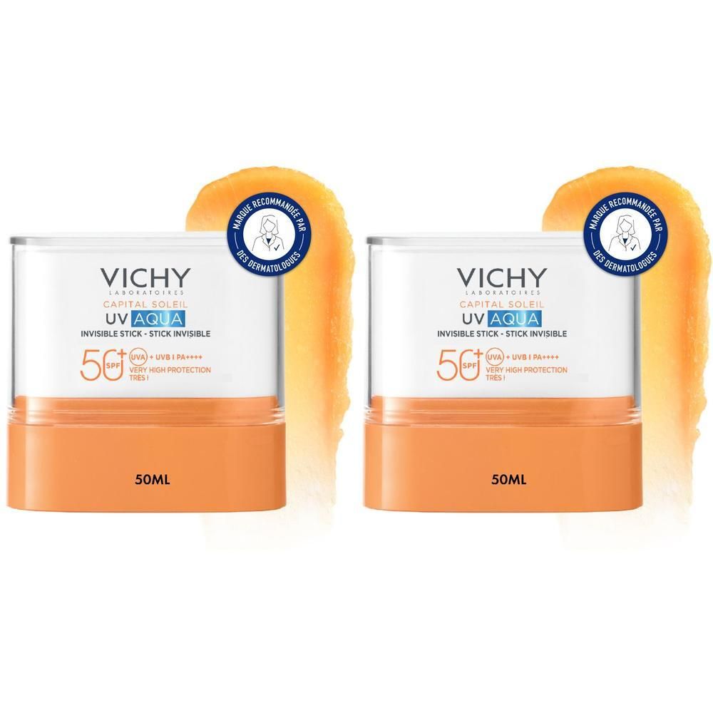 Deux sticks Vichy Capital Soleil UV Aqua SPF50+ en emballage. Design orange et blanc, étui transparent. Inscriptions : marque, SPF50+.