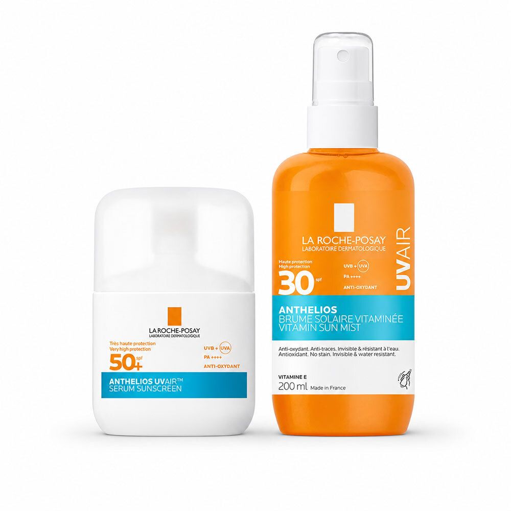 Deux produits solaires. À gauche, sérum, flacon blanc. À droite, spray, flacon orange. Tous deux avec indications SPF.