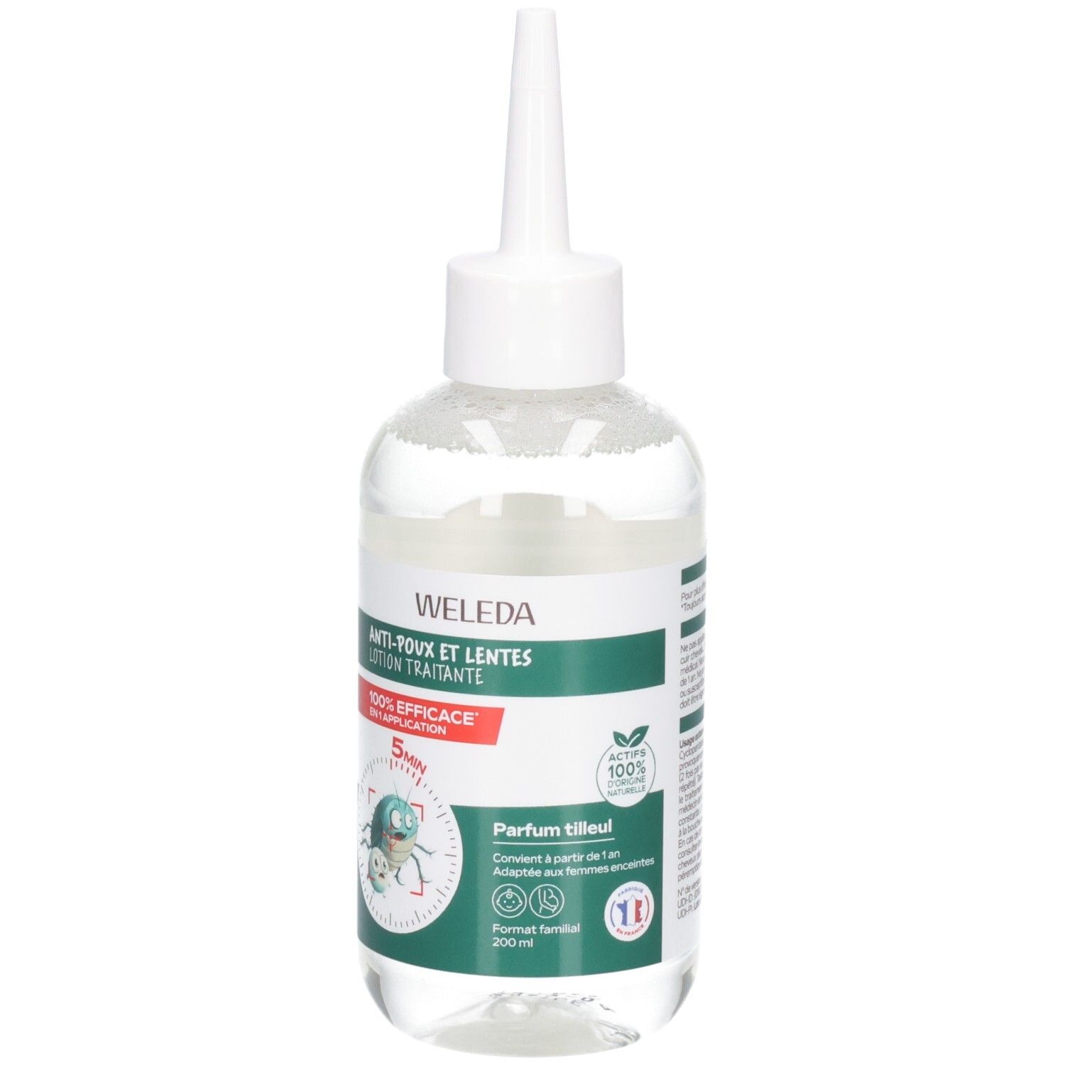 Lotion Weleda anti-poux et lentes en flacon transparent avec applicateur. Gros plan sur l'étiquette.