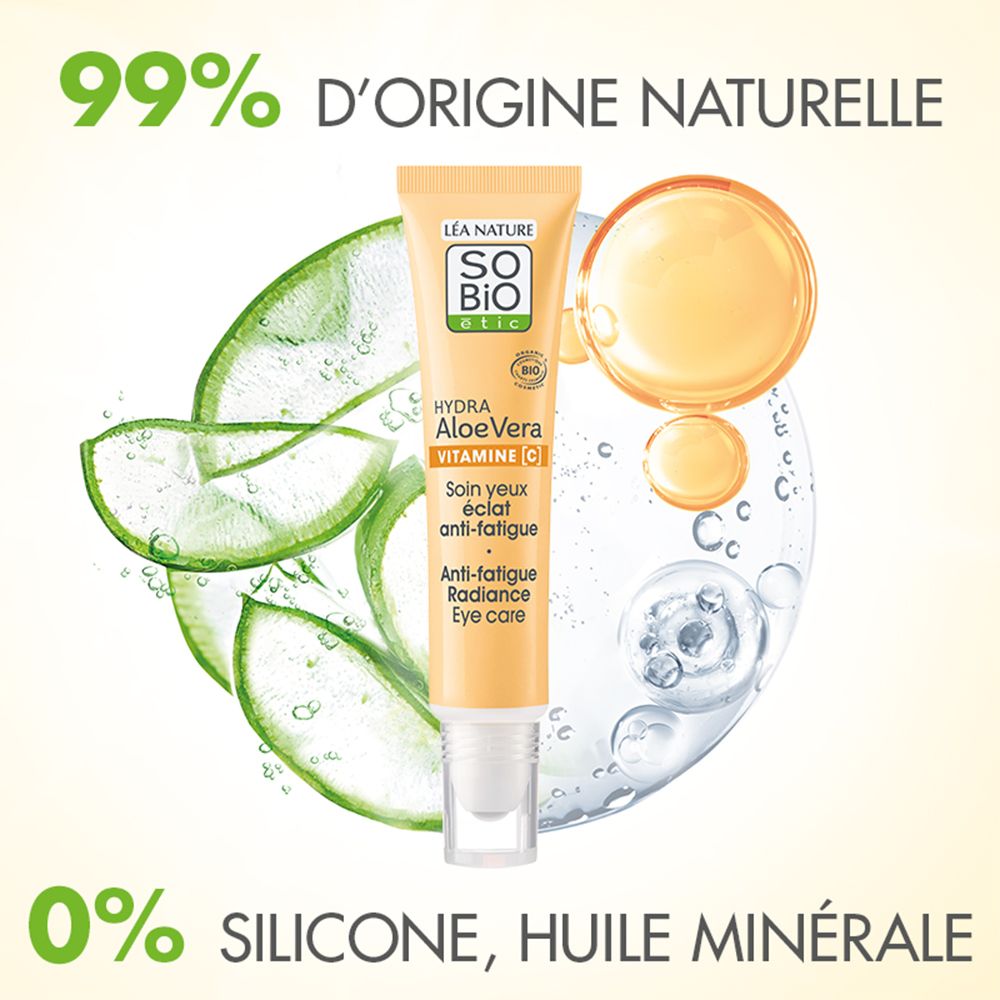 Tube de soin contour des yeux entouré de feuilles d'Aloe Vera et de gouttes d'actifs. 99% d'origine naturelle.