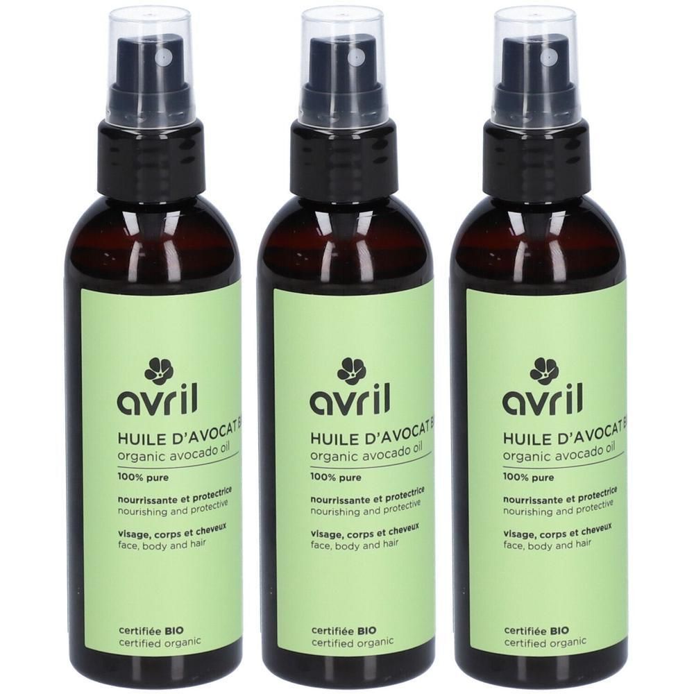 Trois flacons pulvérisateurs bruns avec étiquettes vertes. Les étiquettes indiquent "avril HUILE D'AVOCAT organic avocado oil". Produit bio certifié.
