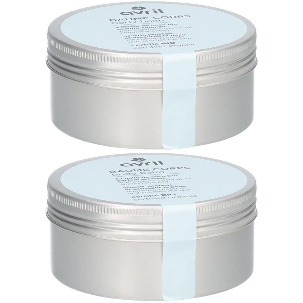 Deux pots argentés avec étiquette bleu clair. Inscription: AVRIL, Baume Corps, Certifié Bio. Emballage de produit.