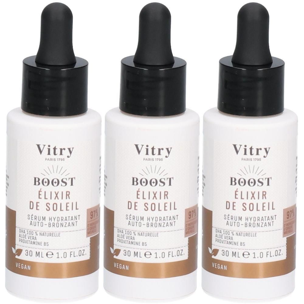 Trois flacons avec bouchon noir et pipette. Inscription: Vitry BOOST ÉLIXIR DE SOLEIL. Contient 30 ml.