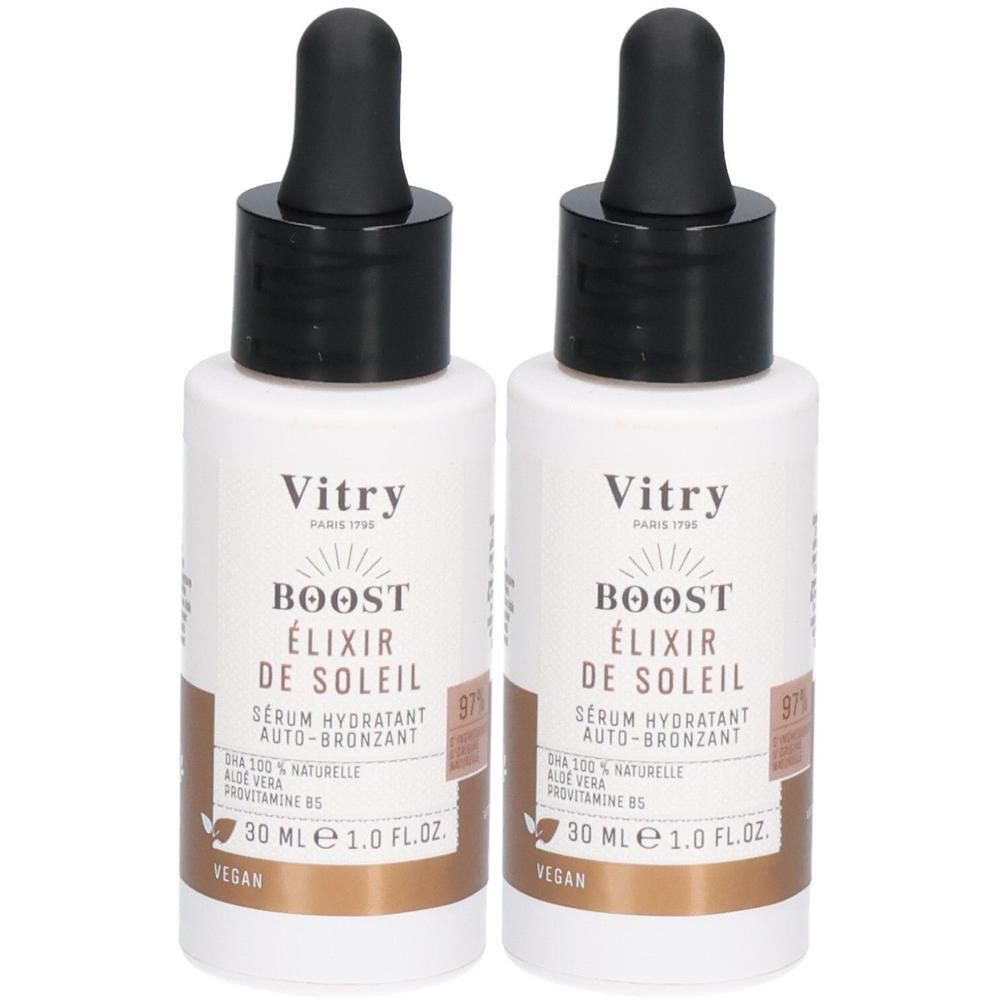 Deux flacons blancs avec bouchon noir. Inscription: Vitry BOOST ÉLIXIR DE SOLEIL, sérum hydratant auto-bronzant, 30 ml, vegan.