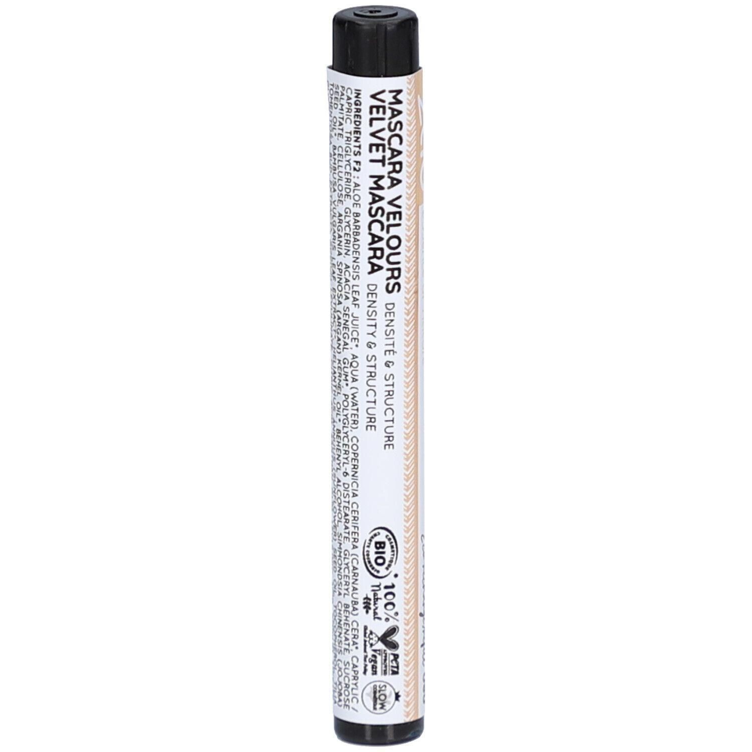 Tube de mascara noir. Inscription: MASCARA VELOURS, VELVET MASCARA. Avec certification bio et logo PETA.
