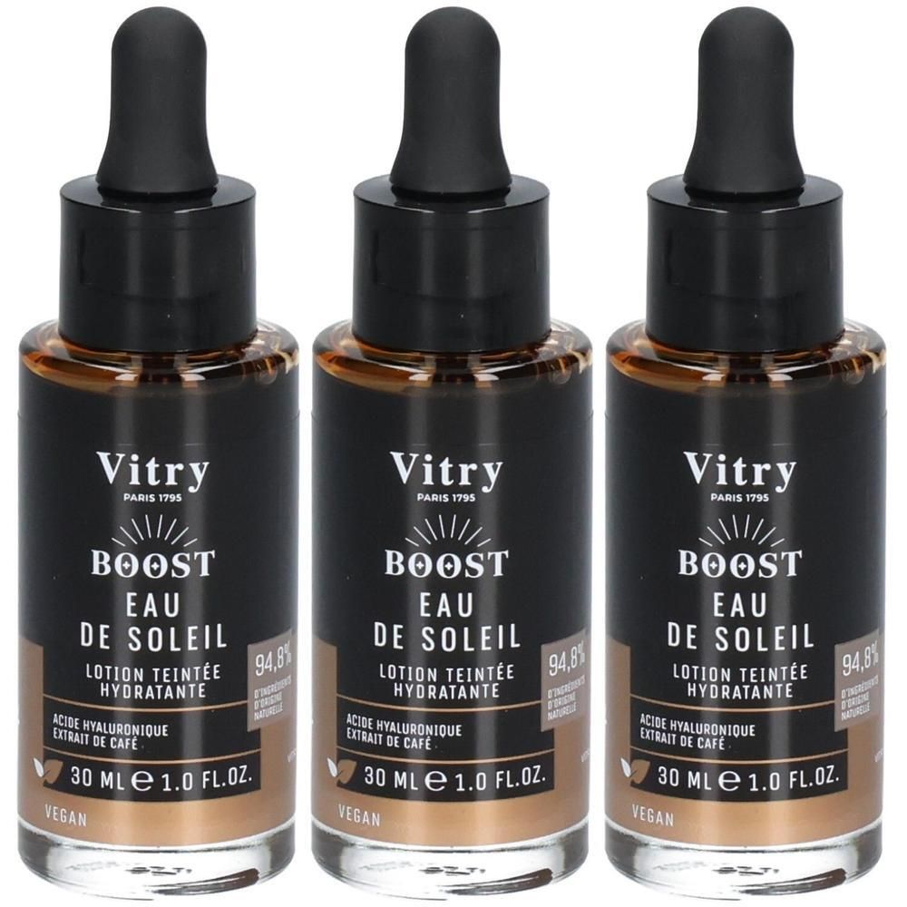 Trois flacons avec bouchon noir et pipette. Inscription: Vitry BOOST EAU DE SOLEIL, Lotion teintée hydratante. 30 ml.