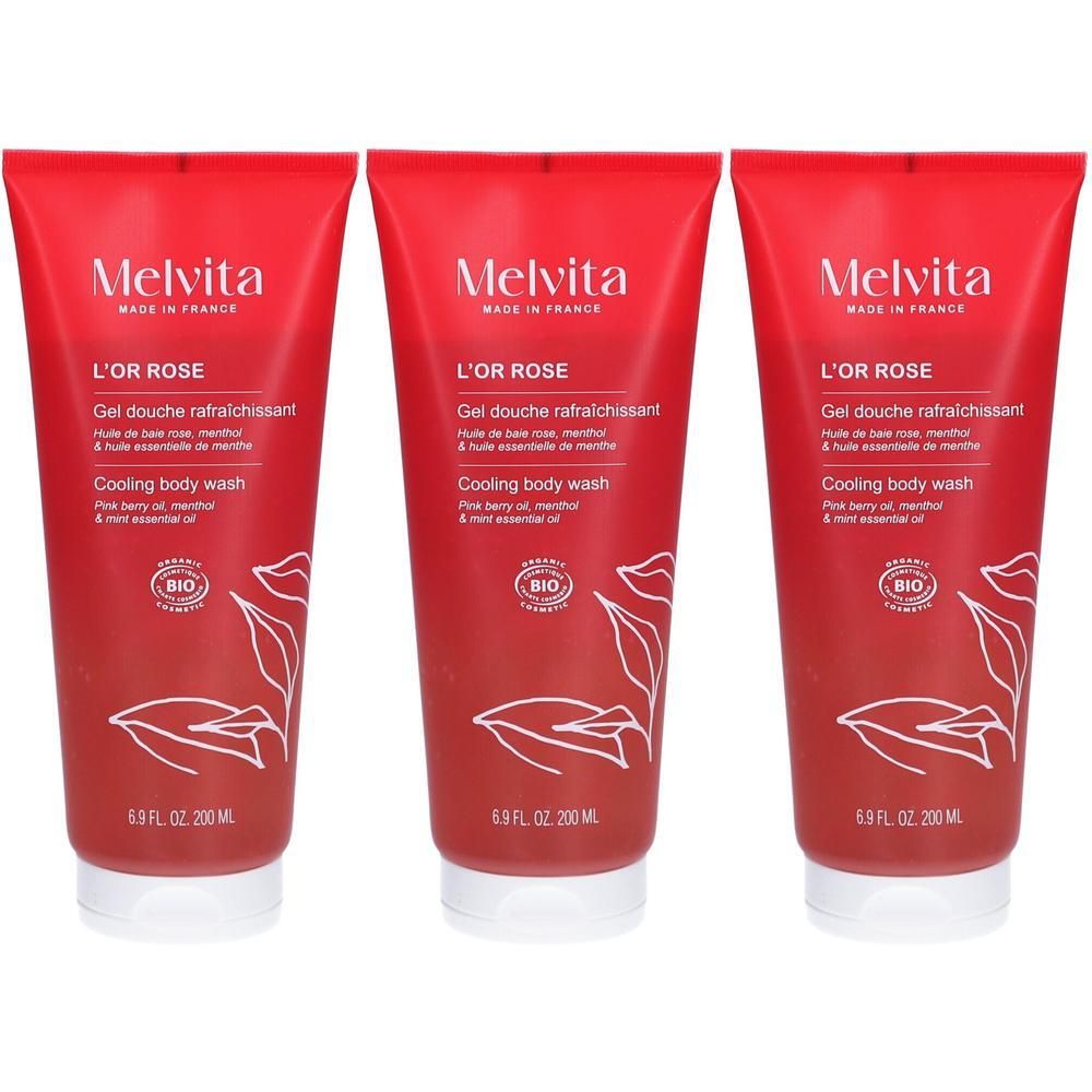 Trois tubes de gel douche rouges. Inscription blanche : L'OR ROSE, Cooling body wash. Certification Bio. 6.8 fl oz.