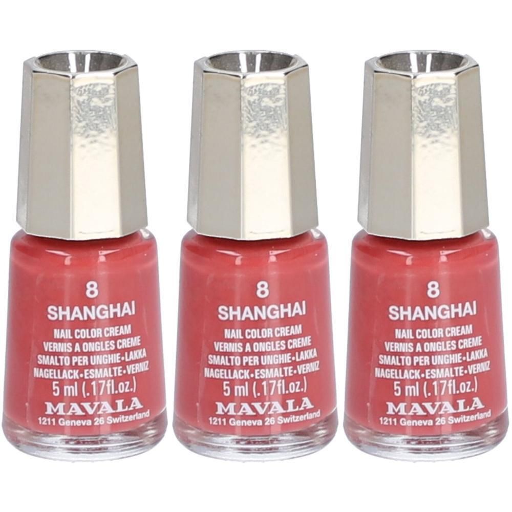 Trois flacons de vernis à ongles rose. Bouchon argenté. Inscription: Shanghai, MAVALA. 5 ml.