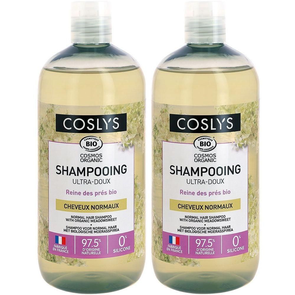 Deux flacons de COSLYS SHAMPOOING ULTRADOUX. Shampoo bio pour cheveux normaux. Étiquette blanche et accents verts. Fabriqué en France.