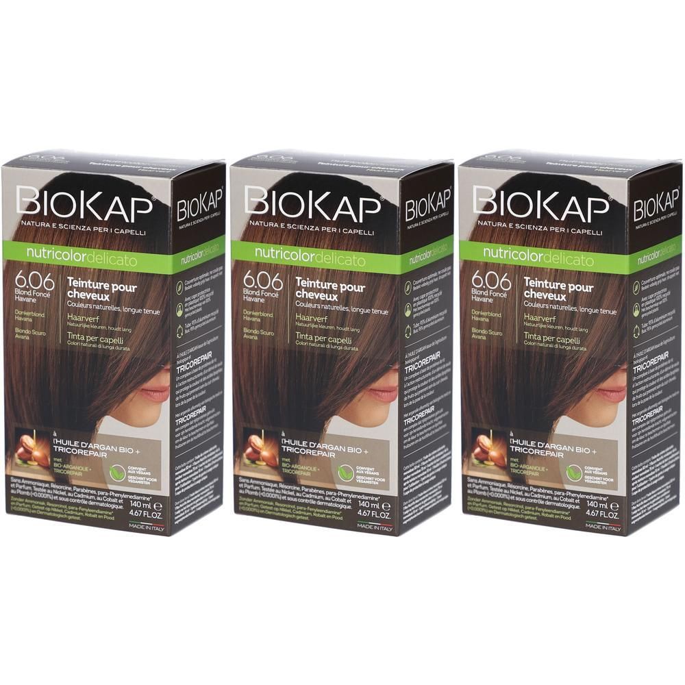 Trois boîtes de teinture capillaire. Chaque boîte porte l'inscription BIOKAP, nutricolor delicato, 6.06 Teinture pour cheveux.