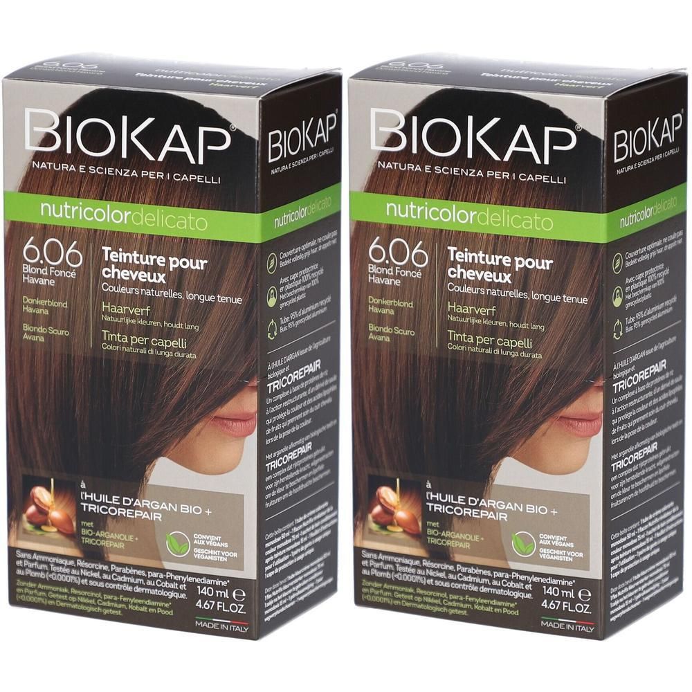 Deux boîtes de teinture capillaire BIOKAP. Inscription : 6.06 Blond Fonc Havane. Avec Tricorepair et huile d'argan. Emballage avec visage de femme.