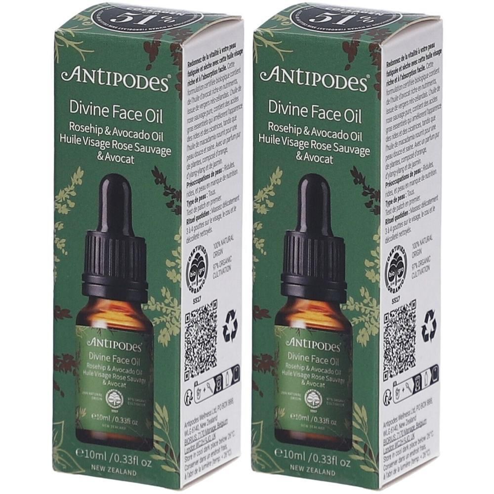 Deux flacons avec compte-gouttes et emballage vert. Inscription : ANTIPODES Divine Face Oil. Rosehip & Avocado Oil.