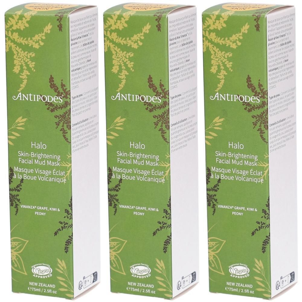 Trois boîtes vertes avec texte. ANTIPODES Halo Skin-Brightening Facial Mud Mask. Ingrédients et volume indiqués. Emballage avec motifs végétaux.