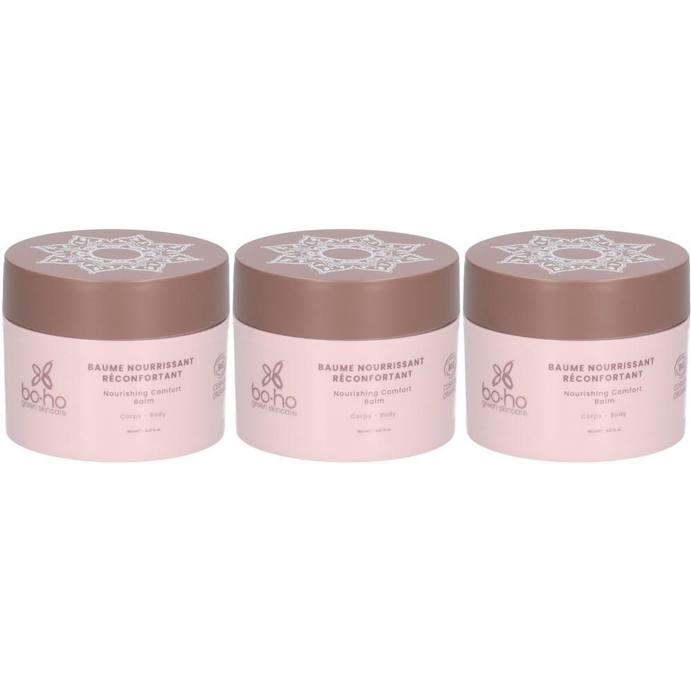 Trois pots ronds roses avec couvercles bruns. On peut lire "BAUME NOURRISSANT RECONFORTANT" sur les pots. Le logo "boho" est également visible.