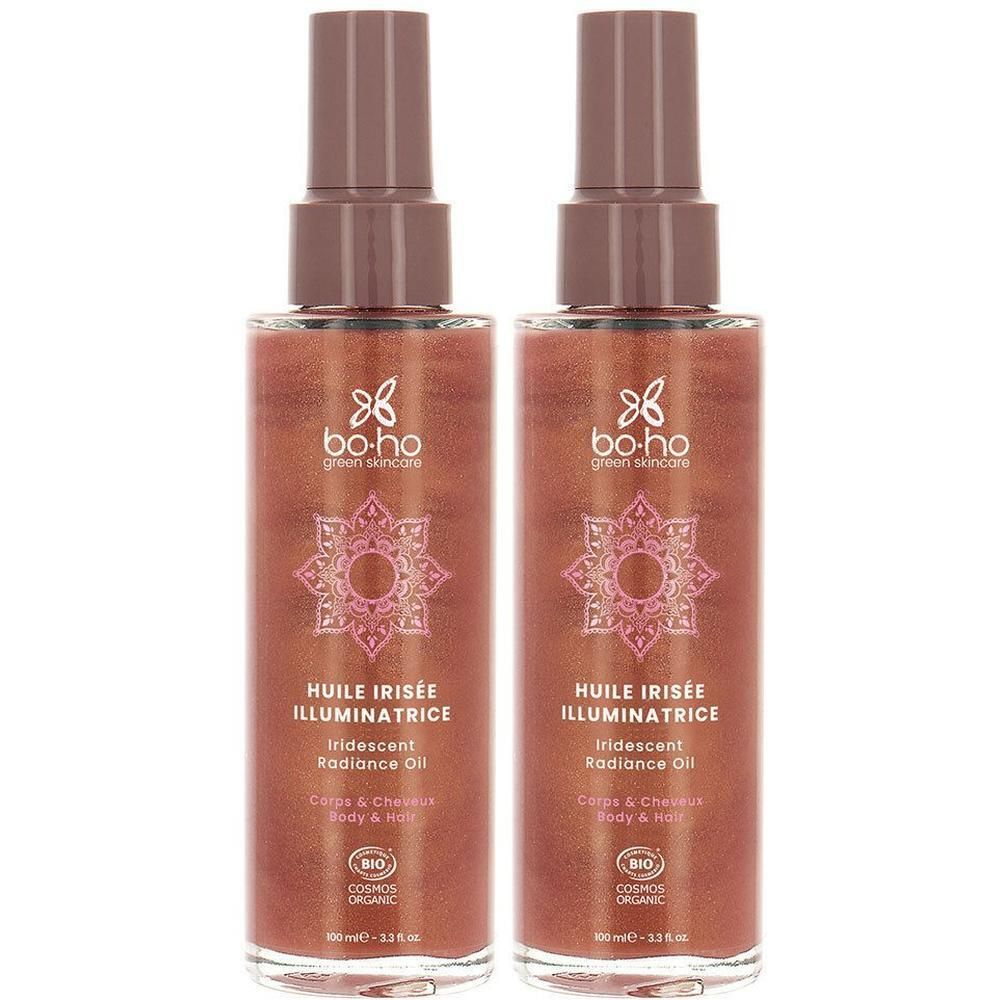 Deux flacons spray. Contenu brun. Inscription: Huile Irisée Illuminatrice, certification Cosmos Organic.