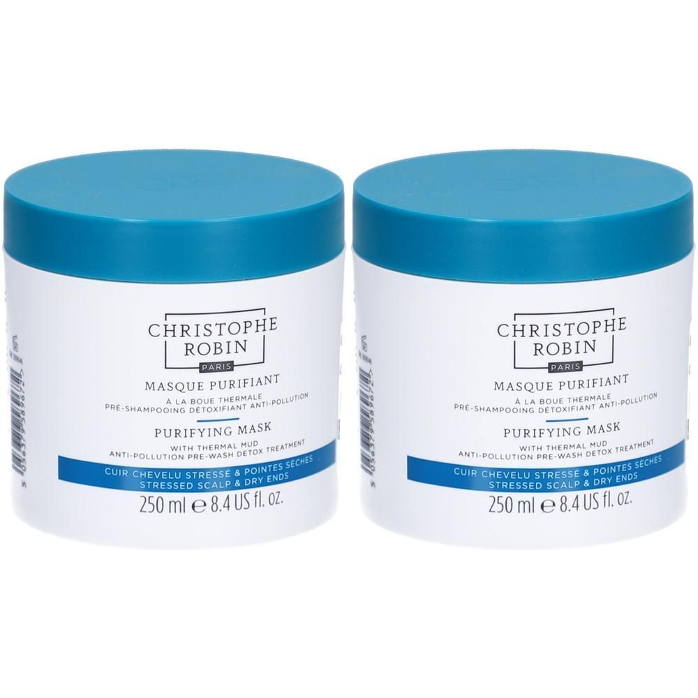 Deux pots blancs avec couvercles bleus. Inscription: CHRISTOPHE ROBIN, MASQUE PURIFIANT, PURIFYING MASK. Pour cuir chevelu stressé et pointes sèches.