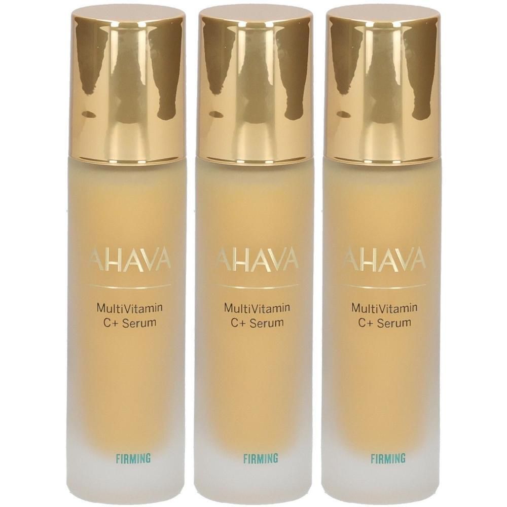 Trois flacons de sérum AHAVA MultiVitamin C+. Flacons en verre avec bouchons dorés. Inscription: FIRMING.