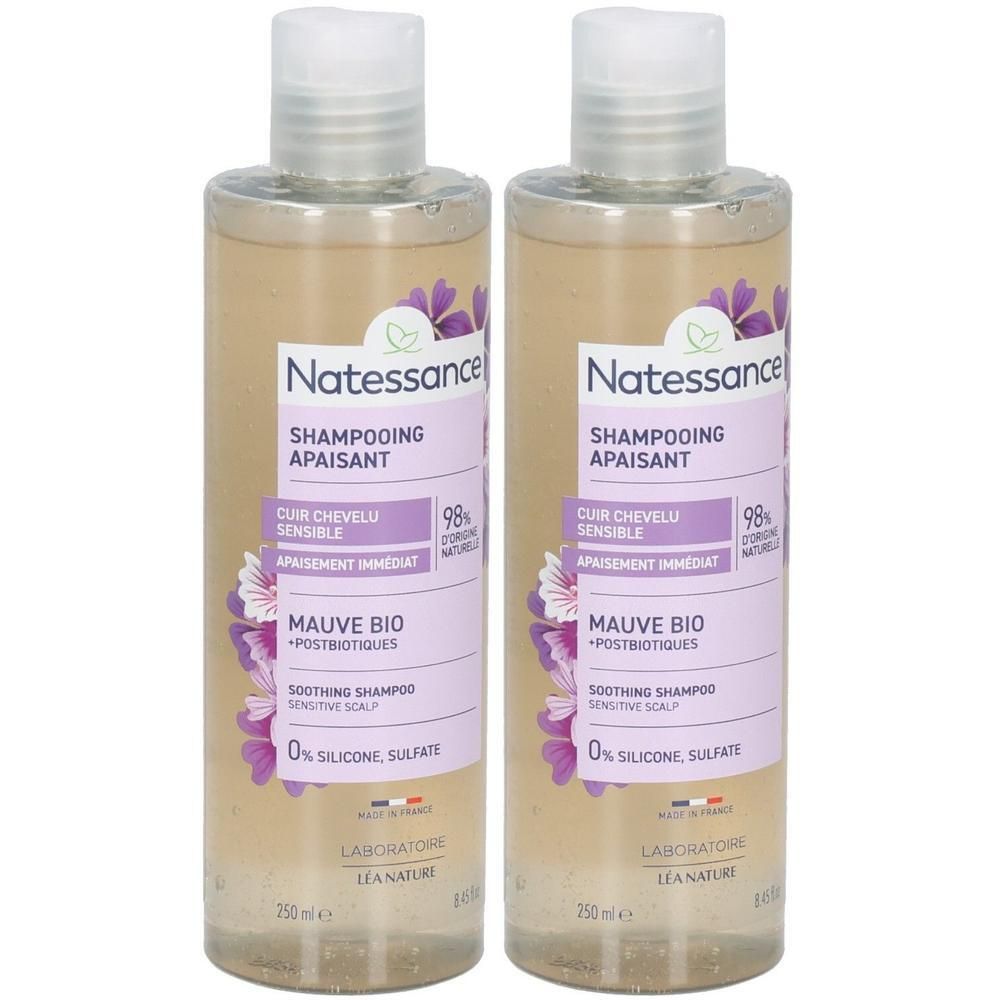 Deux flacons de shampooing Natessance. Inscription: Shampooing Apaisant, Cuir Chevelu Sensible, Mauve Bio. 0% silicone, sulfate. 250ml.