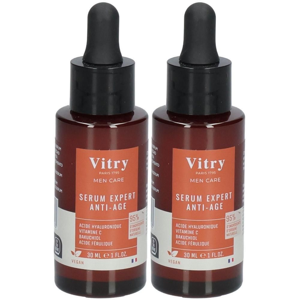 Deux flacons bruns avec bouchon noir. Inscription: Vitry, Sérum Expert Anti-Âge. Contient acide hyaluronique, vitamine C, bakuchiol, acide férulique.