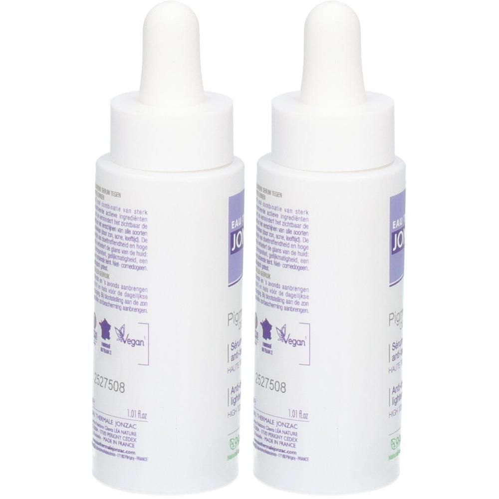 Deux flacons blancs avec pipettes doseuses. Étiquettes avec "Eau Jonzac" et "Pigment Control Serum". Label Vegan.