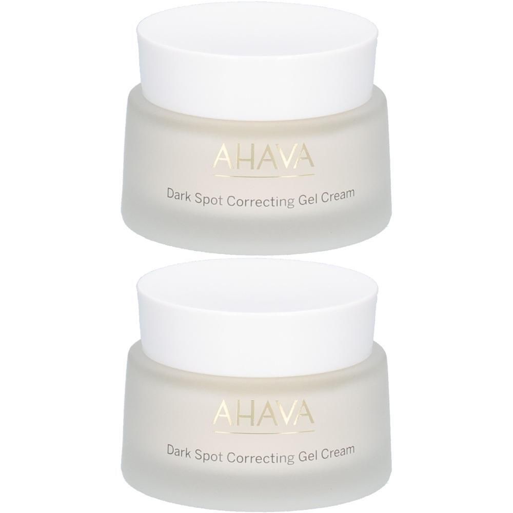 Deux pots de crème avec couvercles blancs. Inscription AHAVA et Dark Spot Correcting Gel Cream.